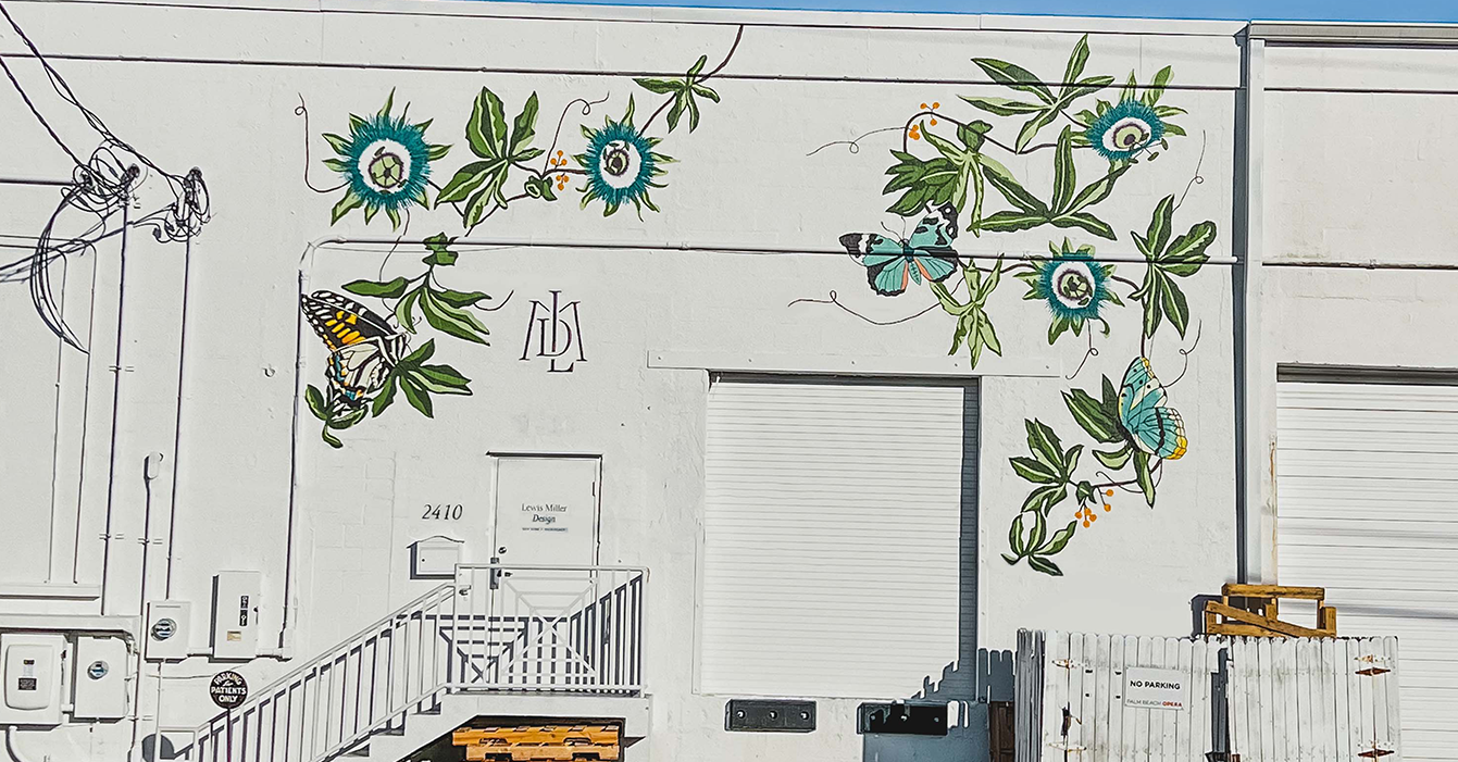 Completed shot of mural of butterflies and passion flowers on the front the building for Lewis Miller Design, a floral event designer in West Palm Beach.